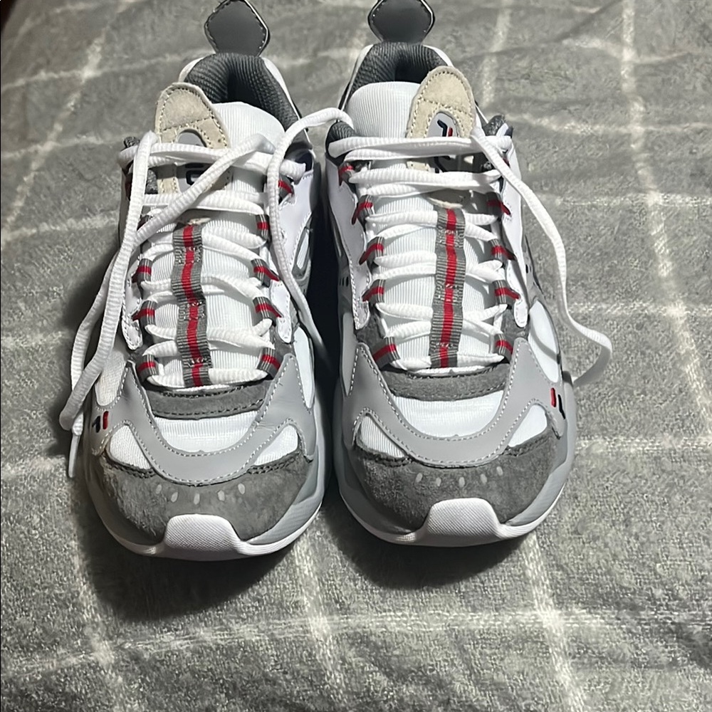 White and Gray Sneakers with Red Accents